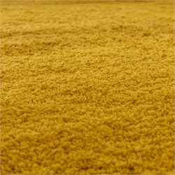 Next Home - large gold coloured cosy twist rug, polyester main with a cotton backing