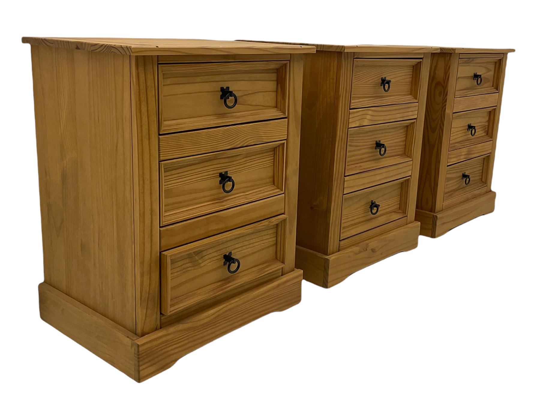 Pair of pine three drawer bedside chests, black iron handles The