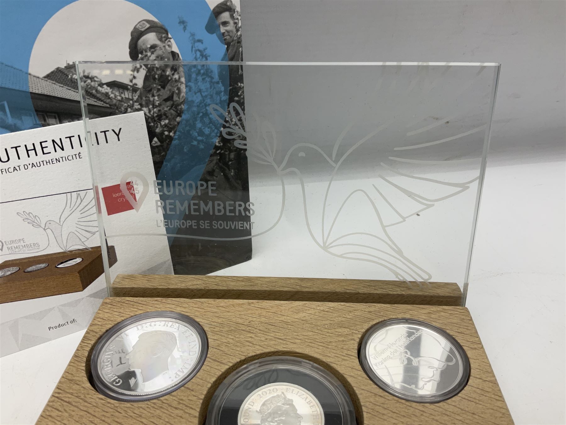 Royal Dutch Mint 'Europe Remembers' silver three coin set, comprised of Royal Canadian Mint 2020 one dollar '75th Anniversary of V-E Day', The Royal Mint 2020 one pound '75th Anniversary of VE Day' and Royal Dutch Mint 2020 five euros '75 Years of Freedom', cased with certificate