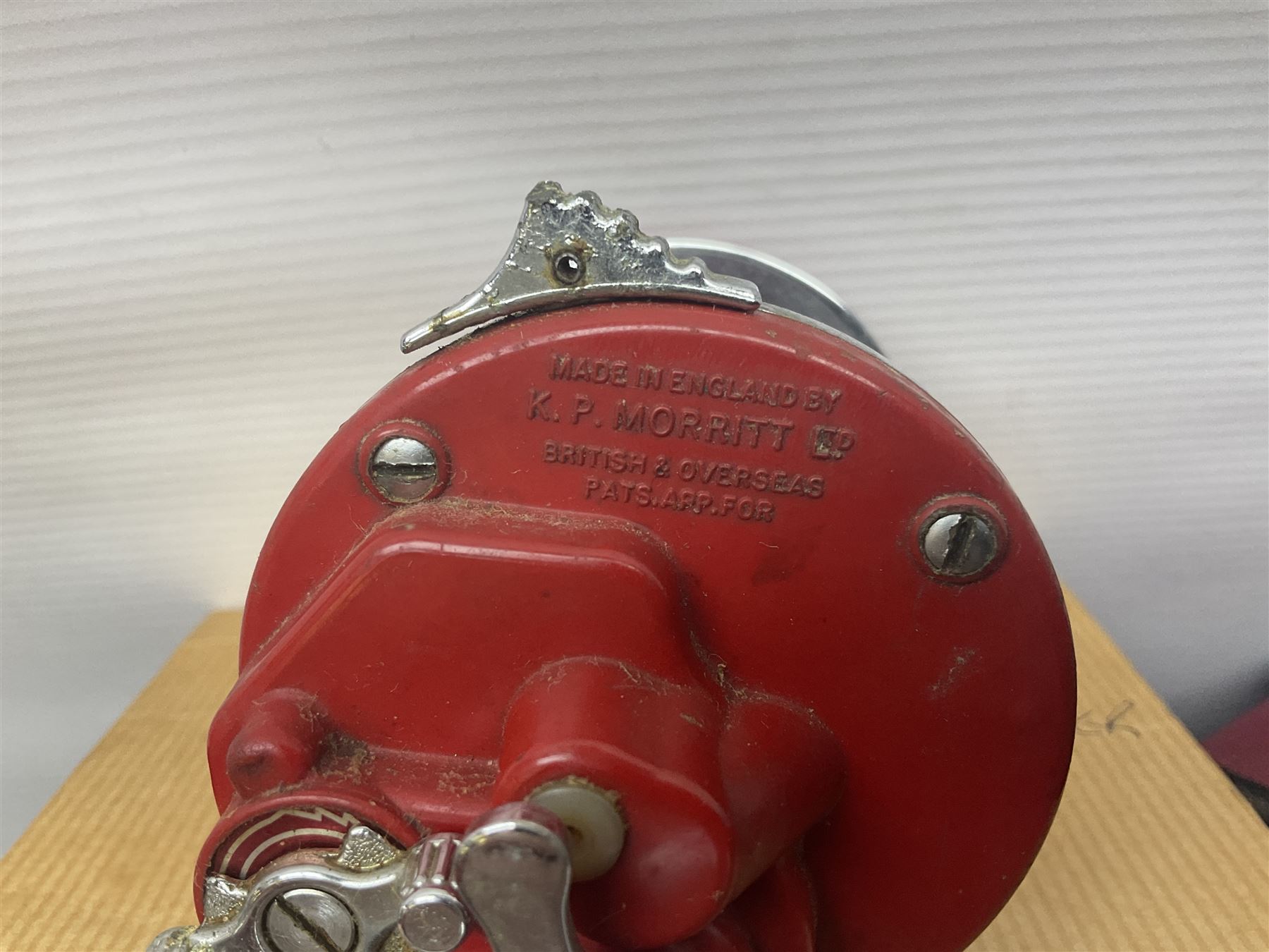 Collection of fishing memorabillia and equipment, including an Allcocks three piece split cane trout fly rod, Shakespeare Salt 3600 surf rod, two tackle bags, Old Red Seastreak multiplier reel, Sportext Saltwater fixed spool reel, fishing dvds, etc