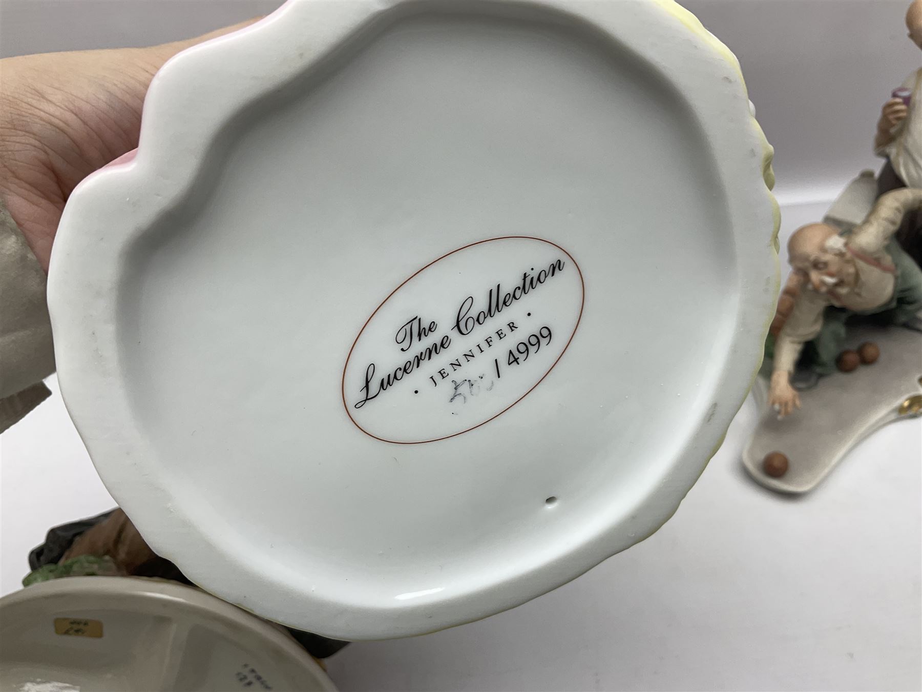 Two Capodimonte figures together with Melba Ware bull and other ceramics 