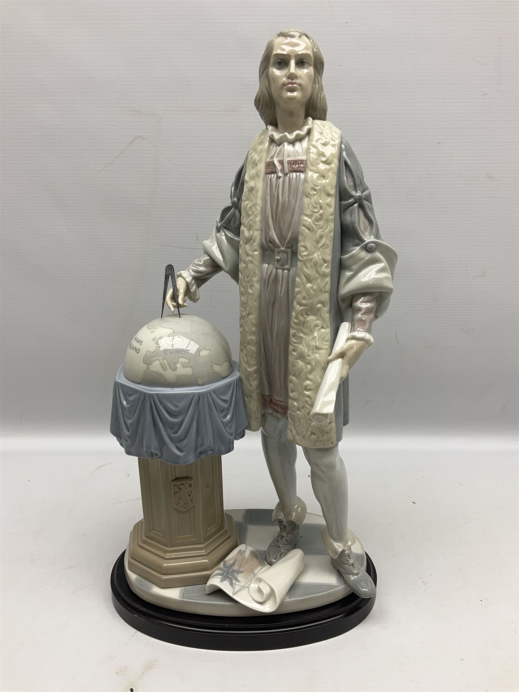 Lladro figure, Columbus, modelled as Christopher Columbus stood by a globe, limited edition 896/1200, no 1432, sculpted by Salvador Furio, with original box, year issued 1982, year retired 1988, H42cm