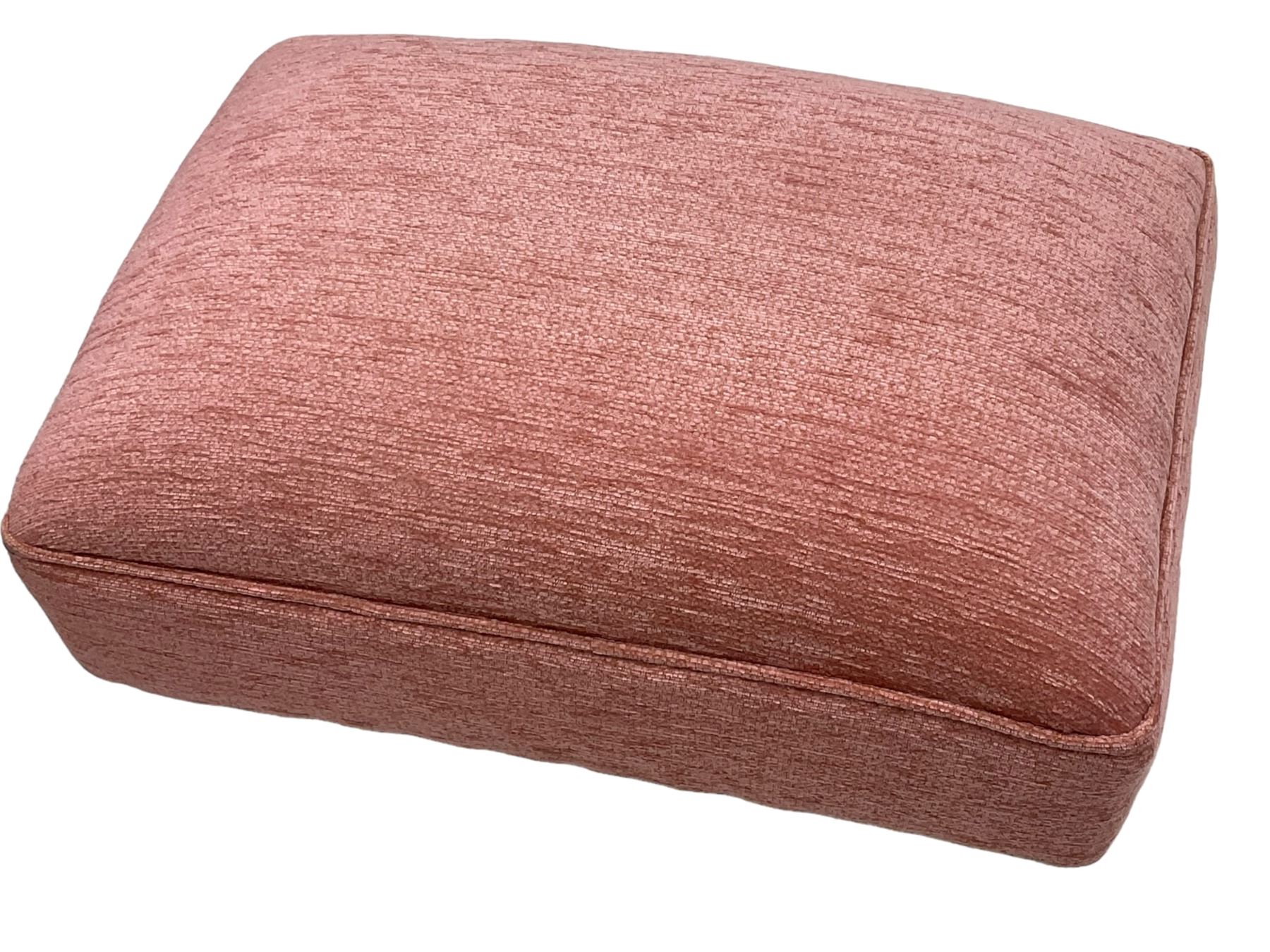 Victorian design armchair, rolled back and arms, upholstered in salmon pink fabric with two scatter cushions (W77cm, H82cm, D94cm); matching rectangular footstool (60cm x 41cm, H28cm)