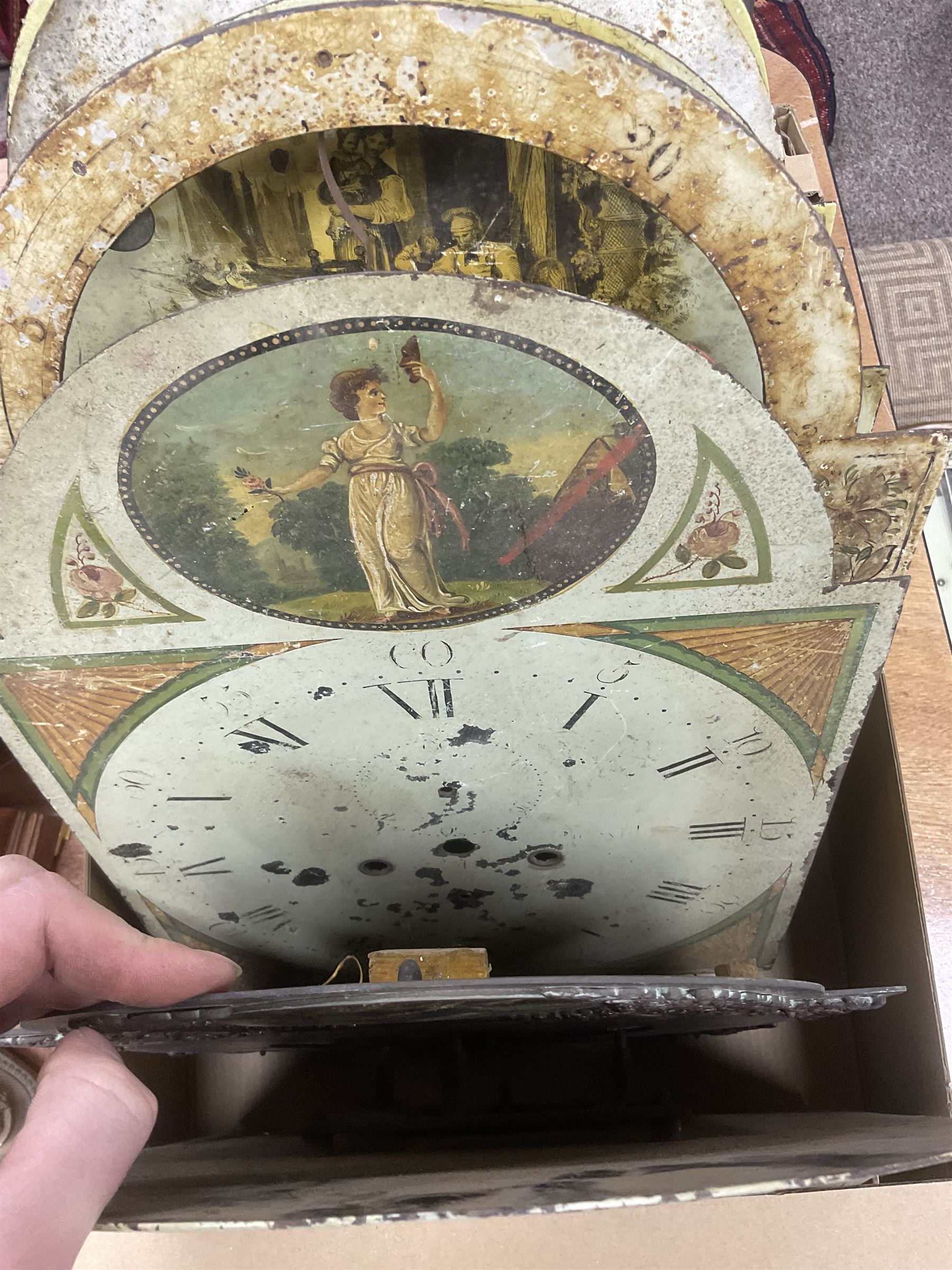 Approximately thirteen longcase clock faces, mainly 18th and 19th century, including brass and painted dials