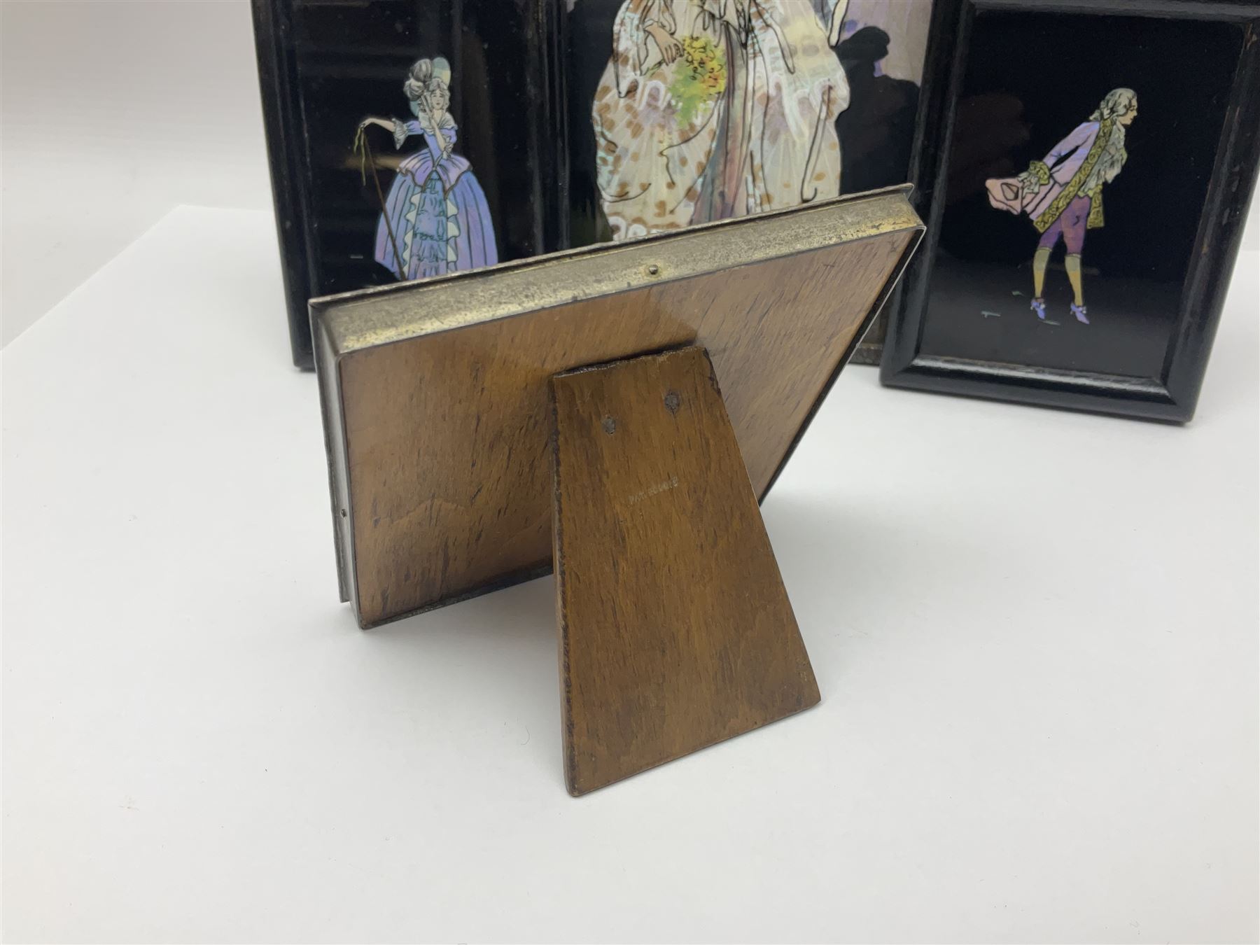 Seven 1930's butterfly wing pictures, mainly of ladies in period dress, one signed Dorothy Buckley, largest H18cm