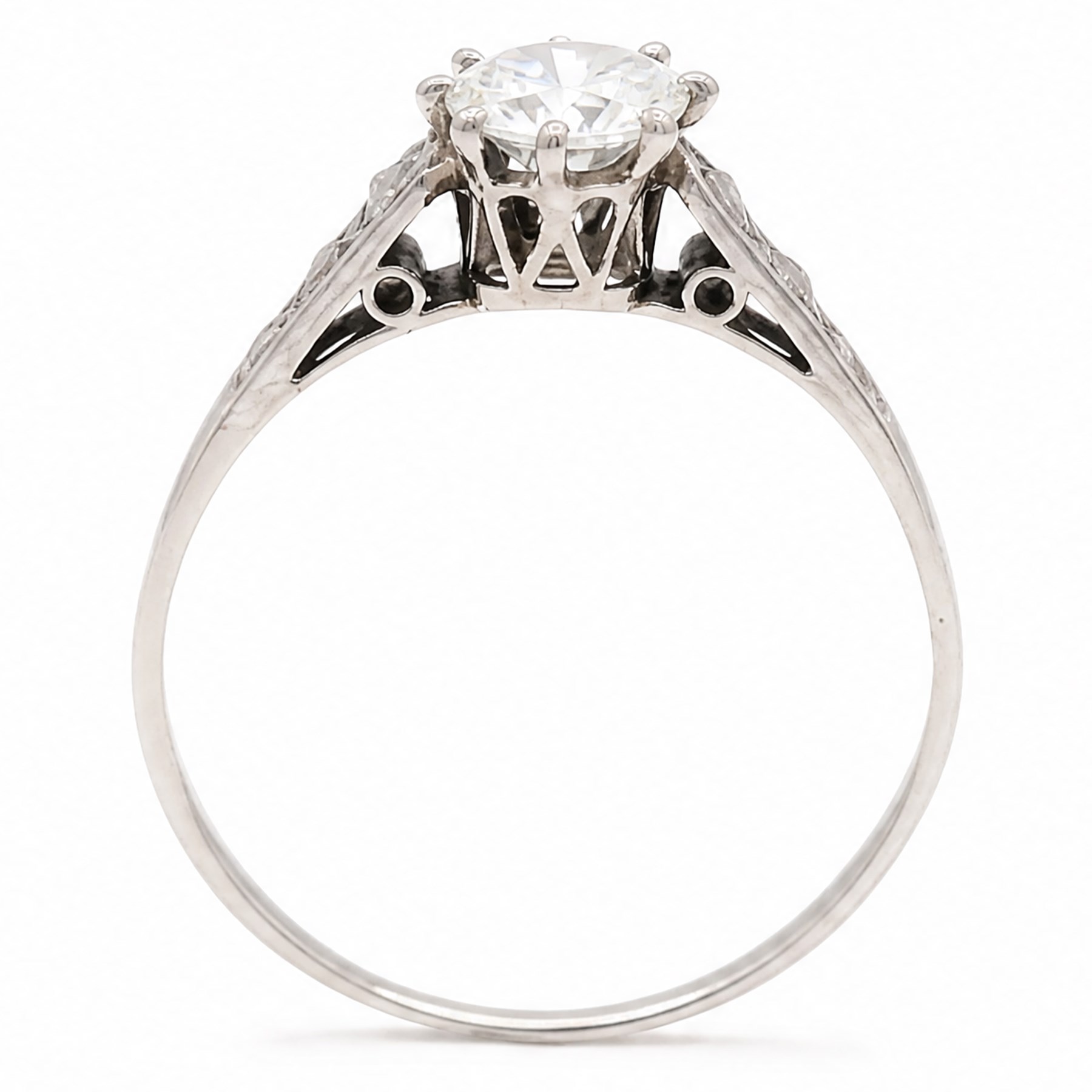 Early 20th century white gold and platinum diamond ring, eight claw set with a single old cut diamond of approx 0.70 carat and rose cut diamond shoulders, stamped PLAT 18ct