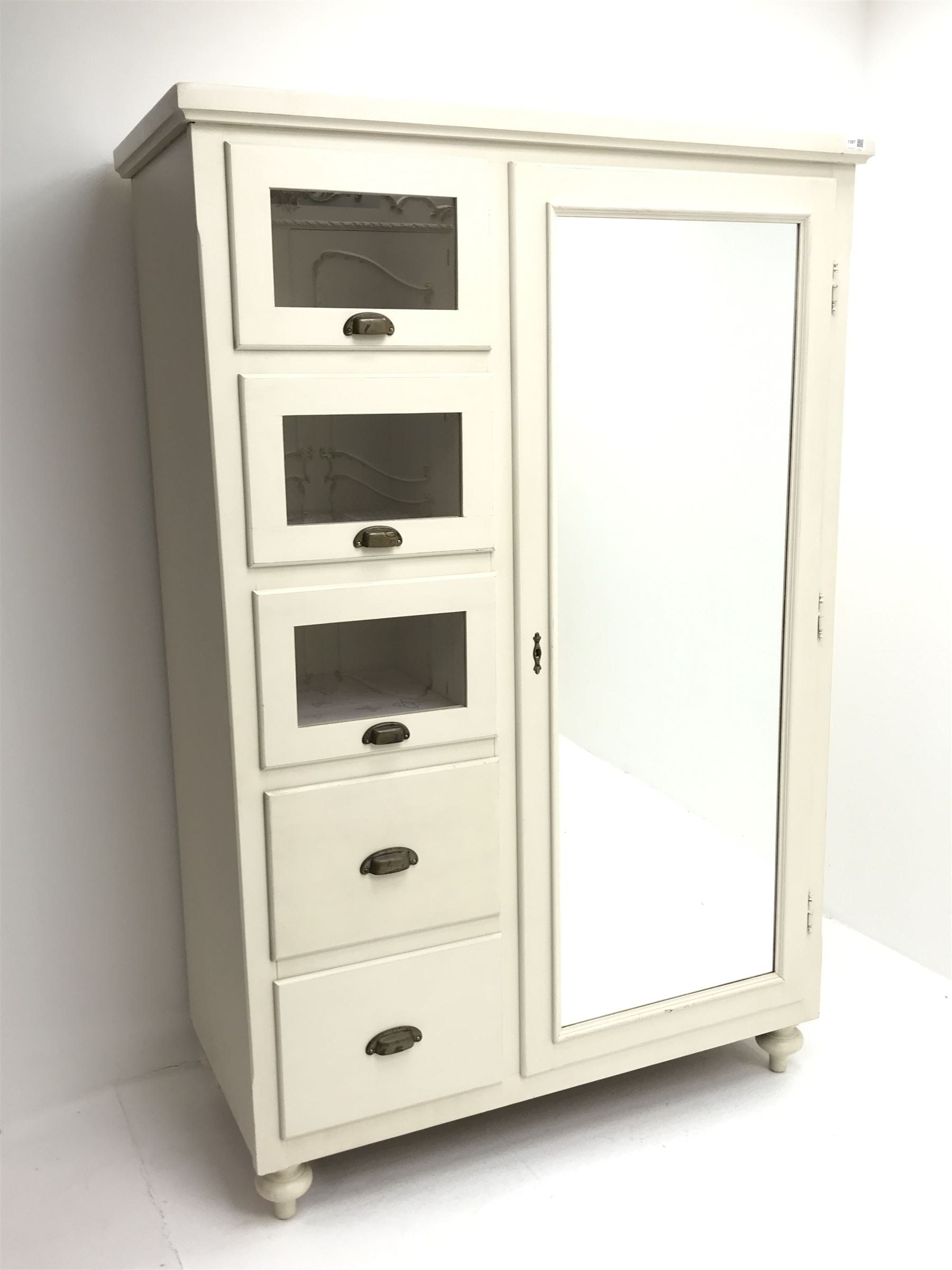 Painted combination chest wardrobe, four drawers alongside single door with full length mirror enclosing hanging rail and two shelves, turned supports