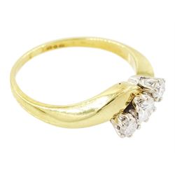 18ct gold diamond crossover ring, set three round brilliant cut diamonds, London 1991, total diamond weight 0.35 carat