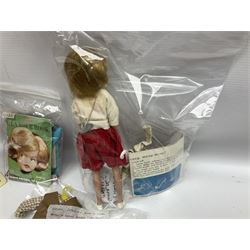 1960s Palitoy Tressy fashion doll, boxed with stand and booklets; four additional Tressy outfits (In The Office, Winter Journey, Winter Sports and Evening Date); two other outfits; and Tressy's Little Sister Toots doll with Style Book and additional outfit