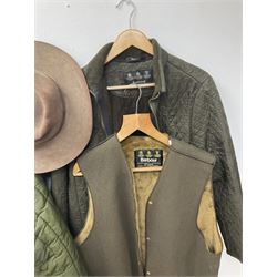 A ladies Barbour quilted dark green jacket, size 14, together with a further Barbour green quilted jacket, no size label, two Barbour 'pile lining' gilets/jacket inserts, two Barbour hats, three Akubra 'pure fur felt' hats, etc. 