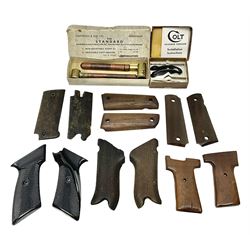 Six pairs of revolver grips;  pair of Lightwood & Son Ltd powder/shot measures in original box; and boxed Colt hammer shroud 