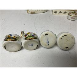 Staffordshire figure of the Duke of Wellington on a bay horse, H30cm in red uniform, together with a similar Staffordshire figure of Dick Turpin, pair of Staffordshire style dogs, H27cm, three Meissen style double salts and two trinket boxes 