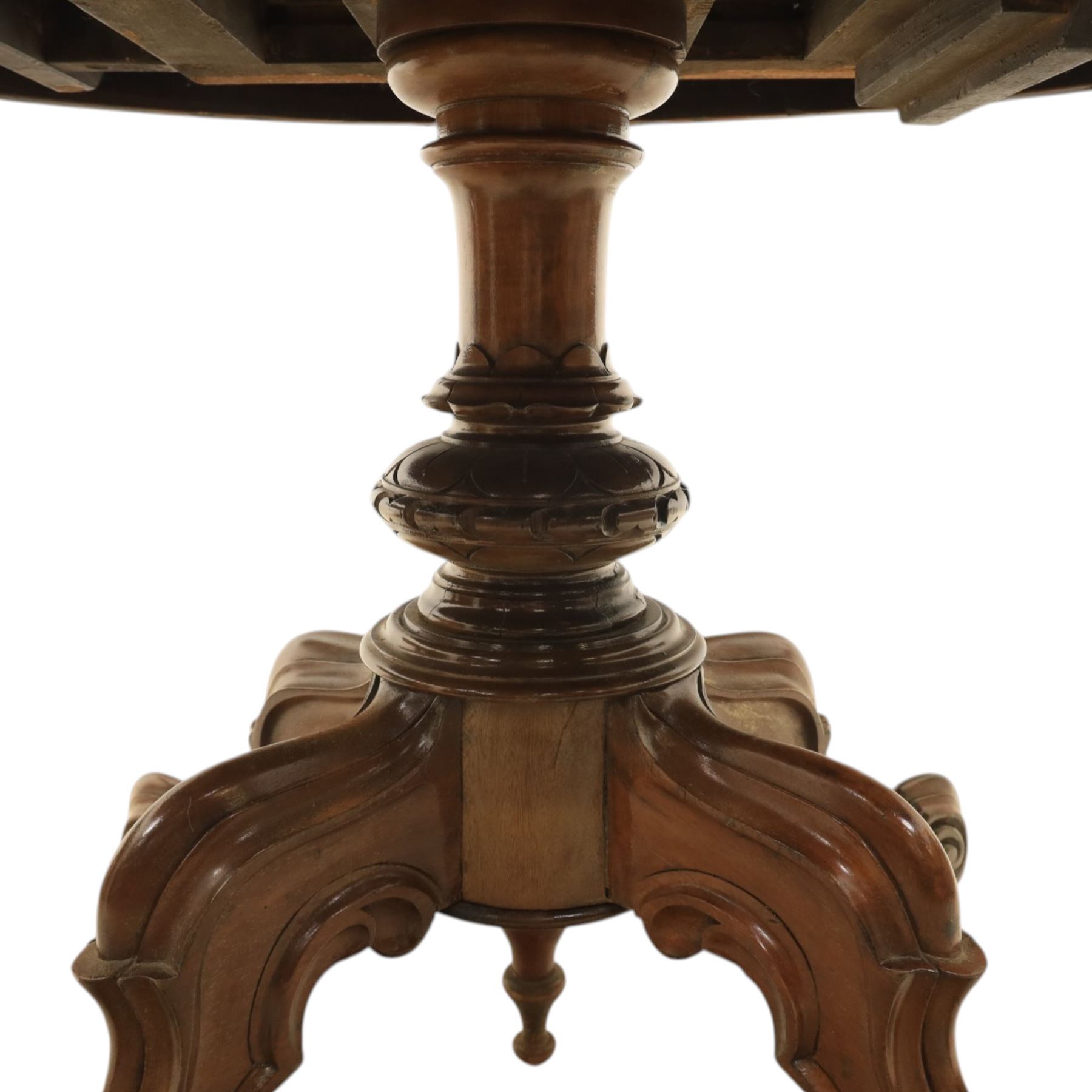 Victorian mahogany oval centre table, raised on turned column with four carved legs, ceramic castors