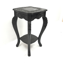 Ebonised heavily carved two tier jardiniere stand, cabriole legs, W43cm, H71cm, D42cm