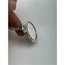 Victorian and later silver chatelaine, the shaped and foliate pierced clasp with embossed oval panel of a courting couple, hallmarked Levi & Salaman, Birmingham 1899, supporting six accessories on five chains: a circular mirror embossed with putti, hallmarked Henry Matthews, Birmingham 1911, pencil holder engraved with foliate scrolls, hallmarked Francis Webb, Birmingham 1914, conical scent bottle decorated with bamboo, (unmarked but testing as silver), aide memoire embossed with putti, hallmarked Samuel M Levi, Birmingham 1911, tape measure of compressed spherical form, hallmarked Henry Matthews, Birmingham 1899, and a purse with embossed putti, hallmarked Birmingham 1909, makers mark worn and indistinct, at longest point L31cm

