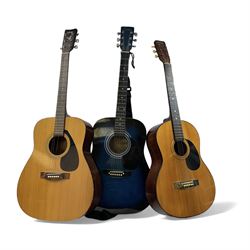 Three acoustic guitars, comprising Yamah