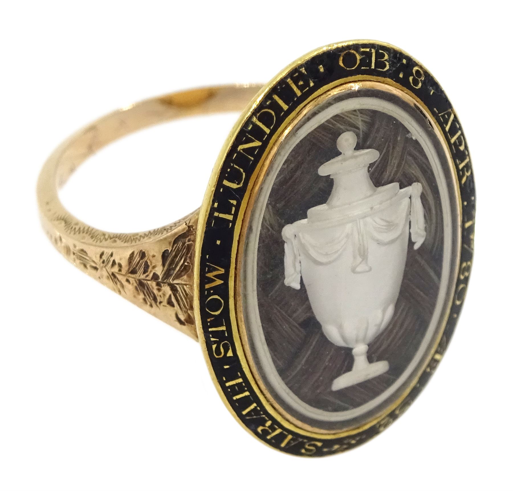 George III gold mourning ring, the bezel enclosing a lock of plaited hair under a reverse white painted urn glass panel, the black enamel border inscribed 'Sarah Stow Lundie OB 8 Apr 1780 AE 32'