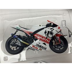 Three Ixo Models 1:12 scale die-cast models of motorcycles - BRB007 Honda NSR500 Michael Doohan 1998; BRB001 Honda RC211V Valentino Rossi 2003; and Yamaha YZR-M1 Colin Edwards MotoGP Phillip Island 2007; all boxed (3)