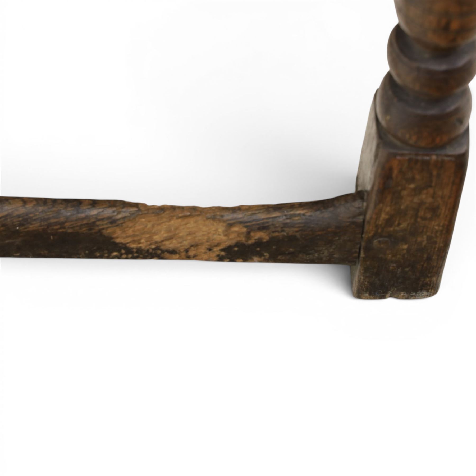Two 19th century oak joint stools raised on turned supports united by stretchers