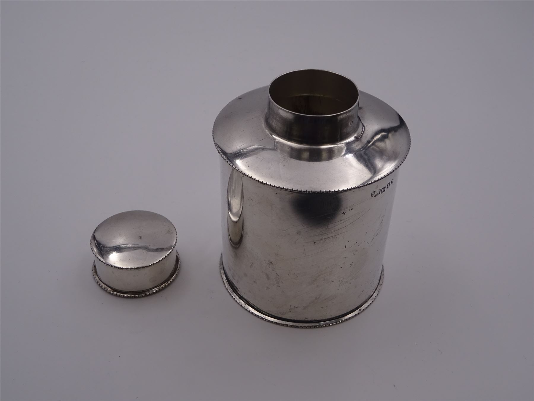 1920's silver tea caddy, of plain cylindrical form, hallmarked Mappin & Webb Ltd, London 1920, H9cm, approximate weight 3.66 ozt (114 grams)
