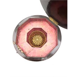 Victorian rosewood work table, circular hinged lid enclosing trumpet shaped body with fitted interior, scroll carved serpentine supports, on tripod base