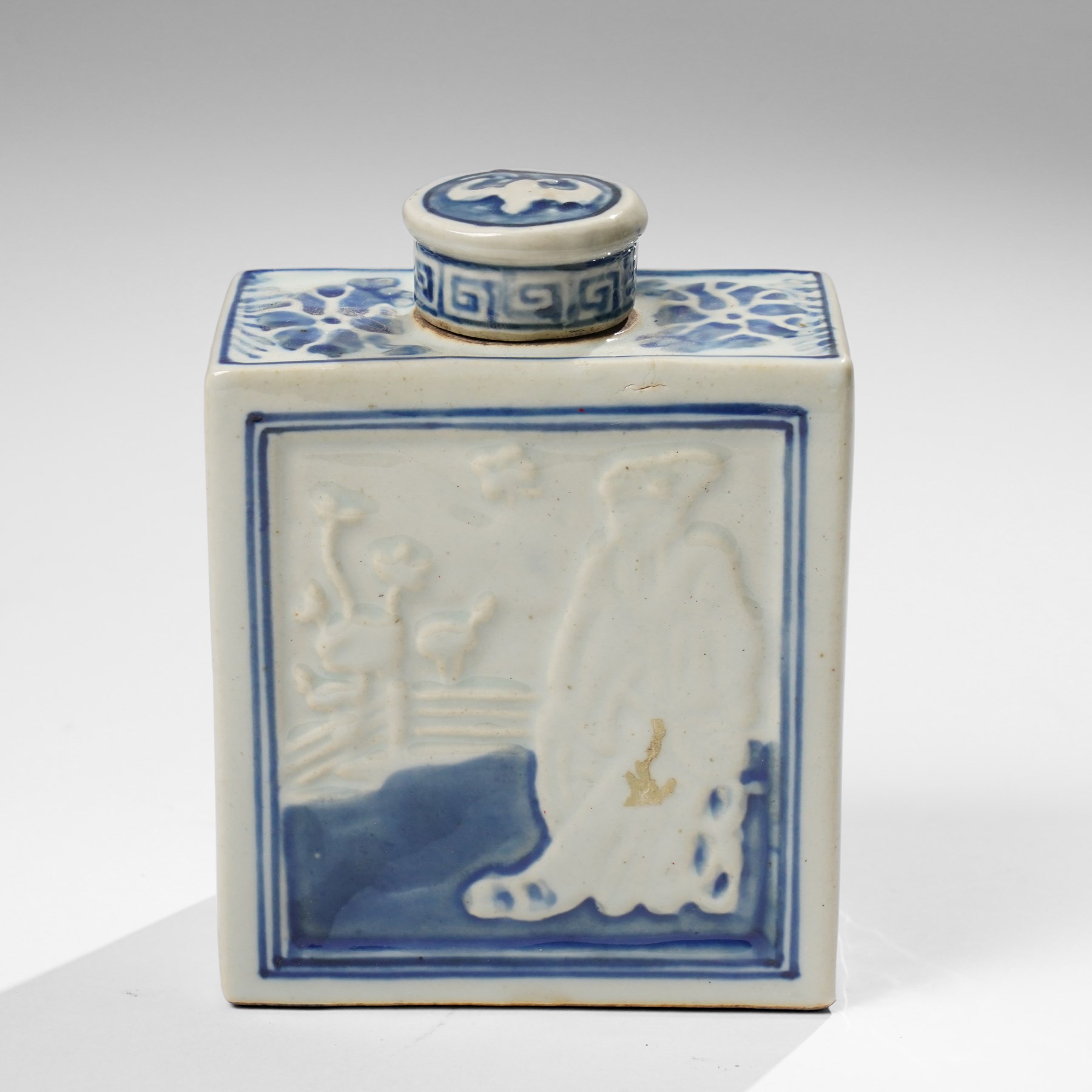 Two Chinese blue and white tea caddys, and another with famille rose design and engraved metal lid, larger H16cm (3)