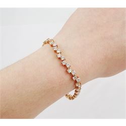 14ct rose gold round brilliant cut diamond bracelet, stamped, total diamond weight approx 8.20 carat
