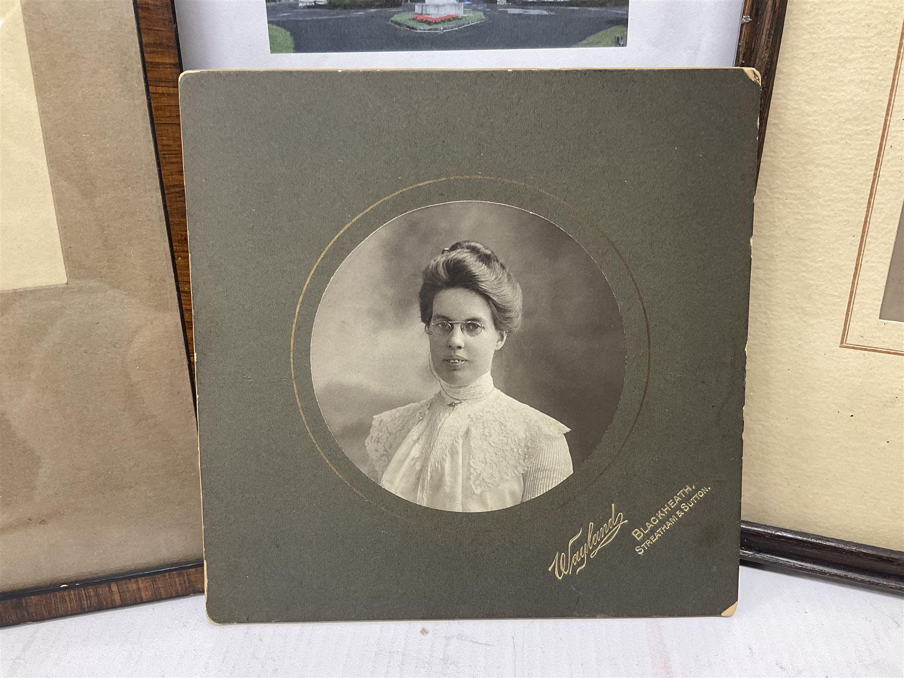 WWI bronze death plaque to Edwin Smith, together with two tankards presented to E.Smith and photographs of his family  