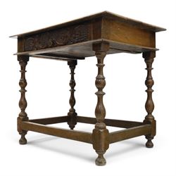 18th century oak lowboy, rectangular top with moulded edge, fitted with single frieze drawer carved with scrolling fruiting vines and stylised plant motifs, raised on bobbin-turned supports united by box stretcher 