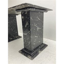 Marble hall table with orthoceras and goniatite inclusions, the rectangular top upon two rectangular stepped plinths, H75cm, L135cm, D78cm 