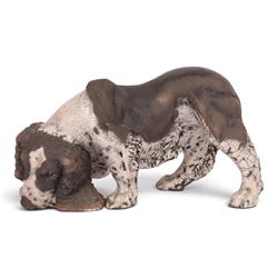 Keza Rudge (British 1966-): raku fired studio pottery sculpture of sniffing dog, H17cm