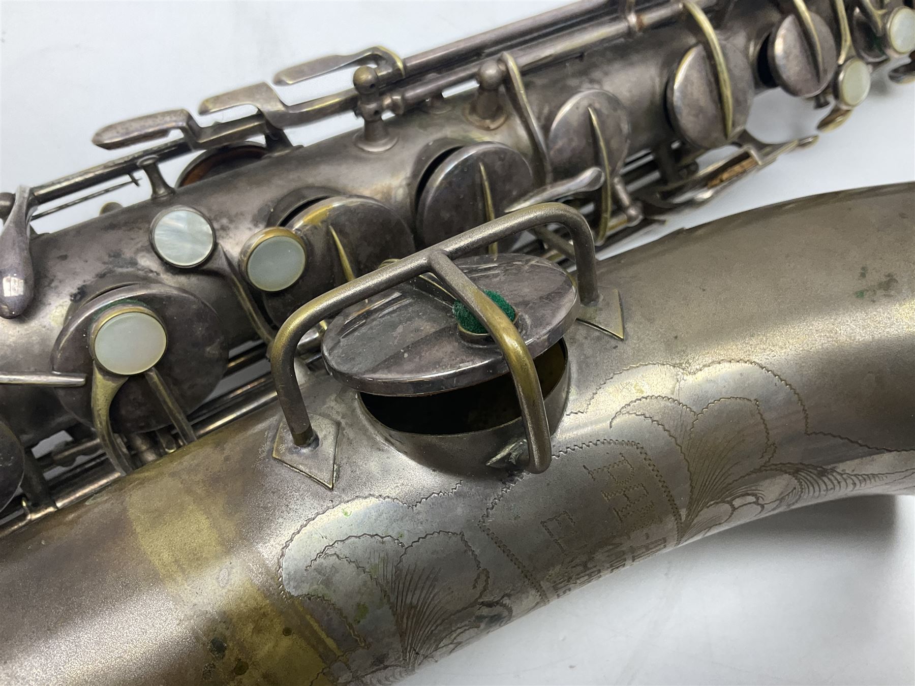 Early 20th century Elkhart Pan American C-Melody saxophone, Patd. Sept.14 1915, no.1153489, serial no.P27678; in fitted hard carrying case with crook