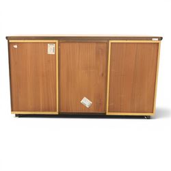Skovby - model '400T' teak sideboard, shaped top above three cupboard doors with recessed handles, fitted with shelving and drawers