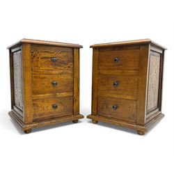Pair of hardwood bedside chests, square tops with moulded edge, each fitted with three dra...