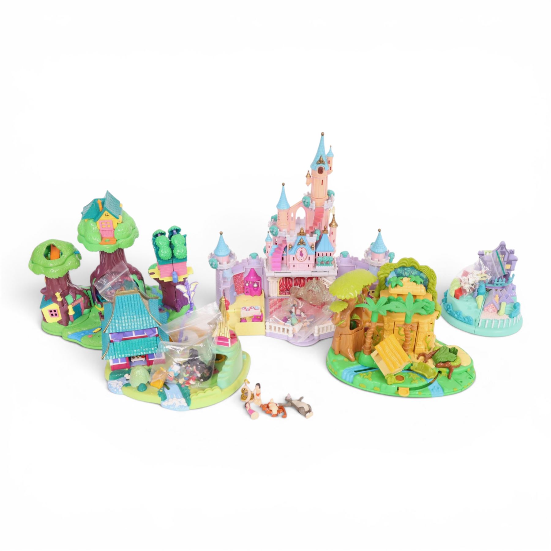 Five Bluebird Polly Pocket Disney playsets, comprising 1998 Jungle Book, complete with three dolls, village hut and tree swing, 1998 Winnie the Pooh 100 Acre Wood, with Winnie the Pooh, Piglet, Tigger, Eeyore and Roo figures and honeypot accessory, 1996 101 Dalmatians Puppies' Adventure, with Cruella De Ville and six puppies, 1995 Cinderella's Enchanted Castle, complete with eight dolls and carriage  and 1997 Mulan's Brave Journey with four dolls and Khan the horse