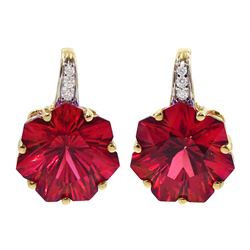 Pair of 9ct gold fancy cut red topaz and diamond stud earrings, stamped 375