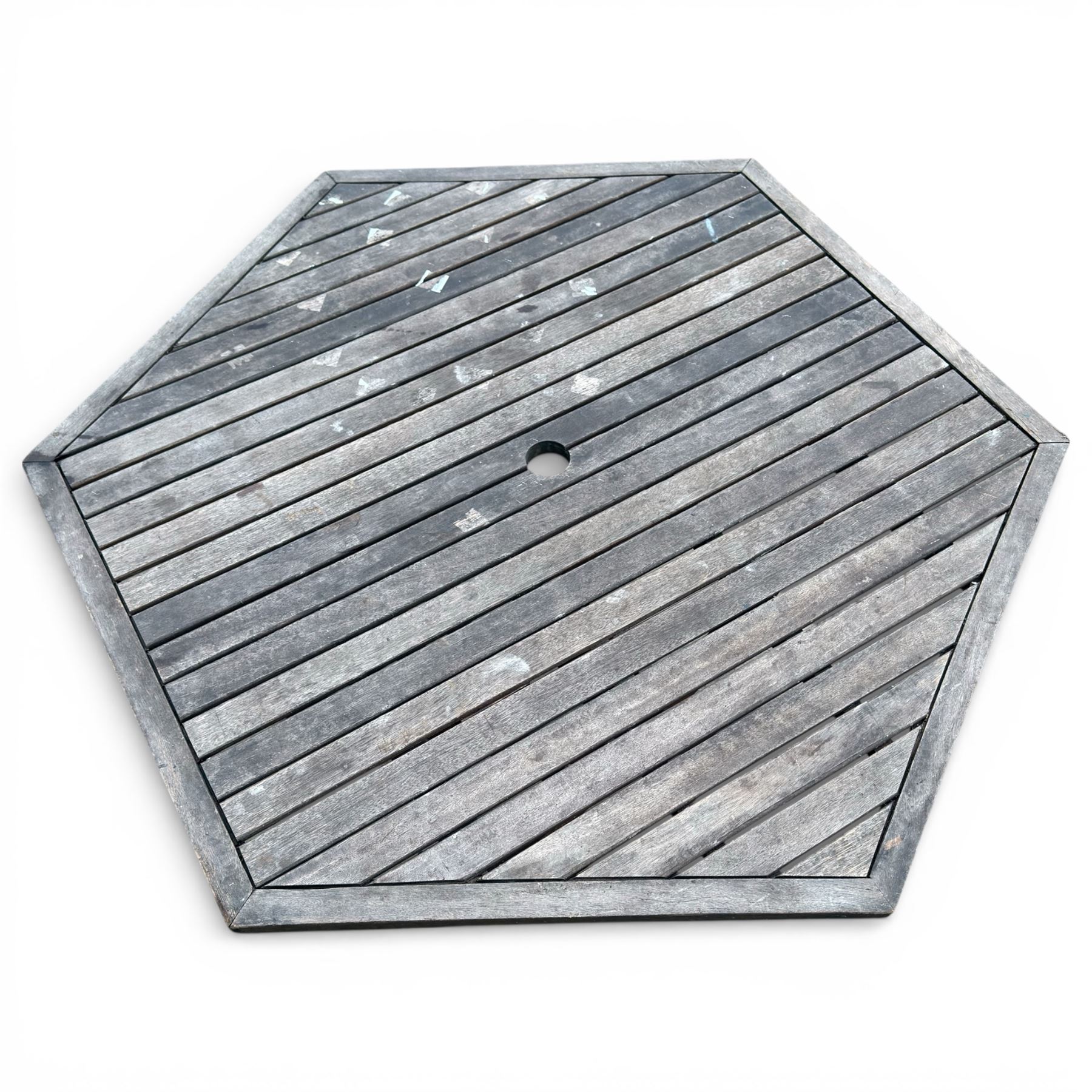 Hexagonal garden table and set of four folding chairs