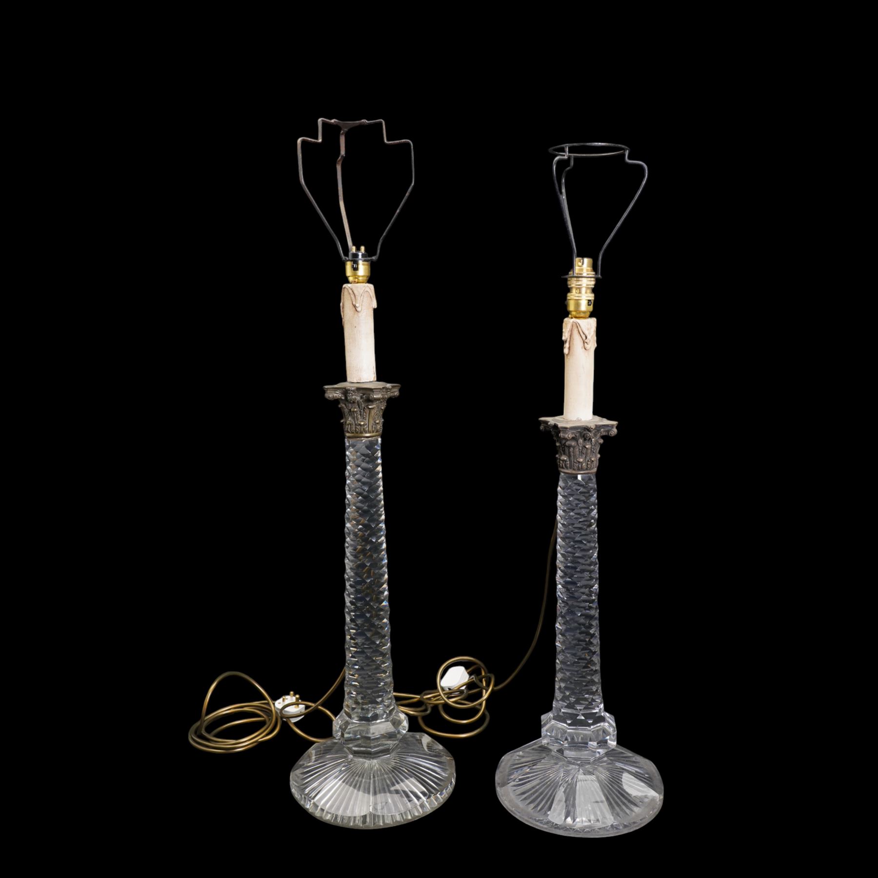 Near pair of large 19th century cut glass table lamps, each of columnar form with diamond cut tapering stem and silver plated Corinthian capital, raised upon a circular faceted foot (one slightly smaller), H71cm overall 