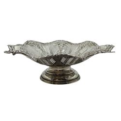 Early 20th century silver pedestal fruit bowl, pierced and embossed decoration with shell and scroll fluted border, possibly by Joseph Rodgers & Sons hallmarks rubbed, approx 12oz