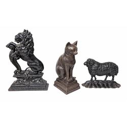Cast Iron Door Stop in the Form of a Ram together with another doorstop in the form of a lion and a composite figure of a seated cat 