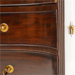 George III mahogany serpentine chest, moulded top over four cock-beaded drawers, the top drawer fitted with baize lined slide opening to reveal divisions,  enclosed by canted and fluted upright corners, the drawer fronts fitted with brass swan neck handles and circular plates with oval escutcheons, lower moulded edge over bracket feet, on lignum vitae castors