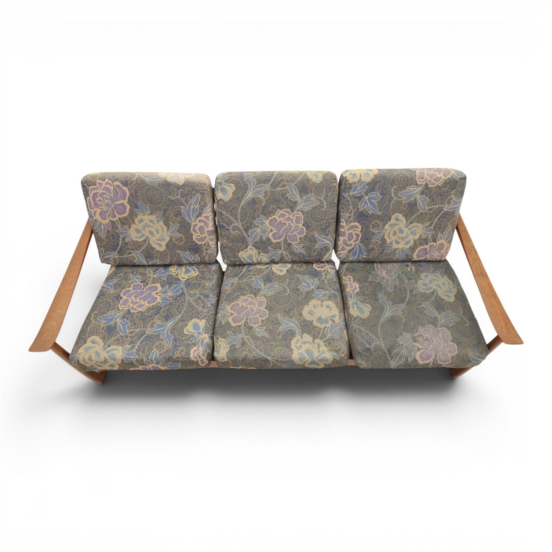 Peter Hvidt and Orla Mølgaard for France and Son - mid-20th century model FD130 teak framed three seater settee, foliate design loose cushion 