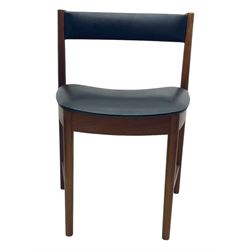 Mid-20th century teak extending dining table, circular top with pull-out extension and concealed leaf extension mechanism, on tapered supports; set of four teak dining chairs with black vinyl padded seats 