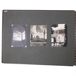 Two early to mid 20th century postcard albums, containing black and white and colour postcards of France, Turkey and Egypt, together with some personal photographs and newspaper clippings