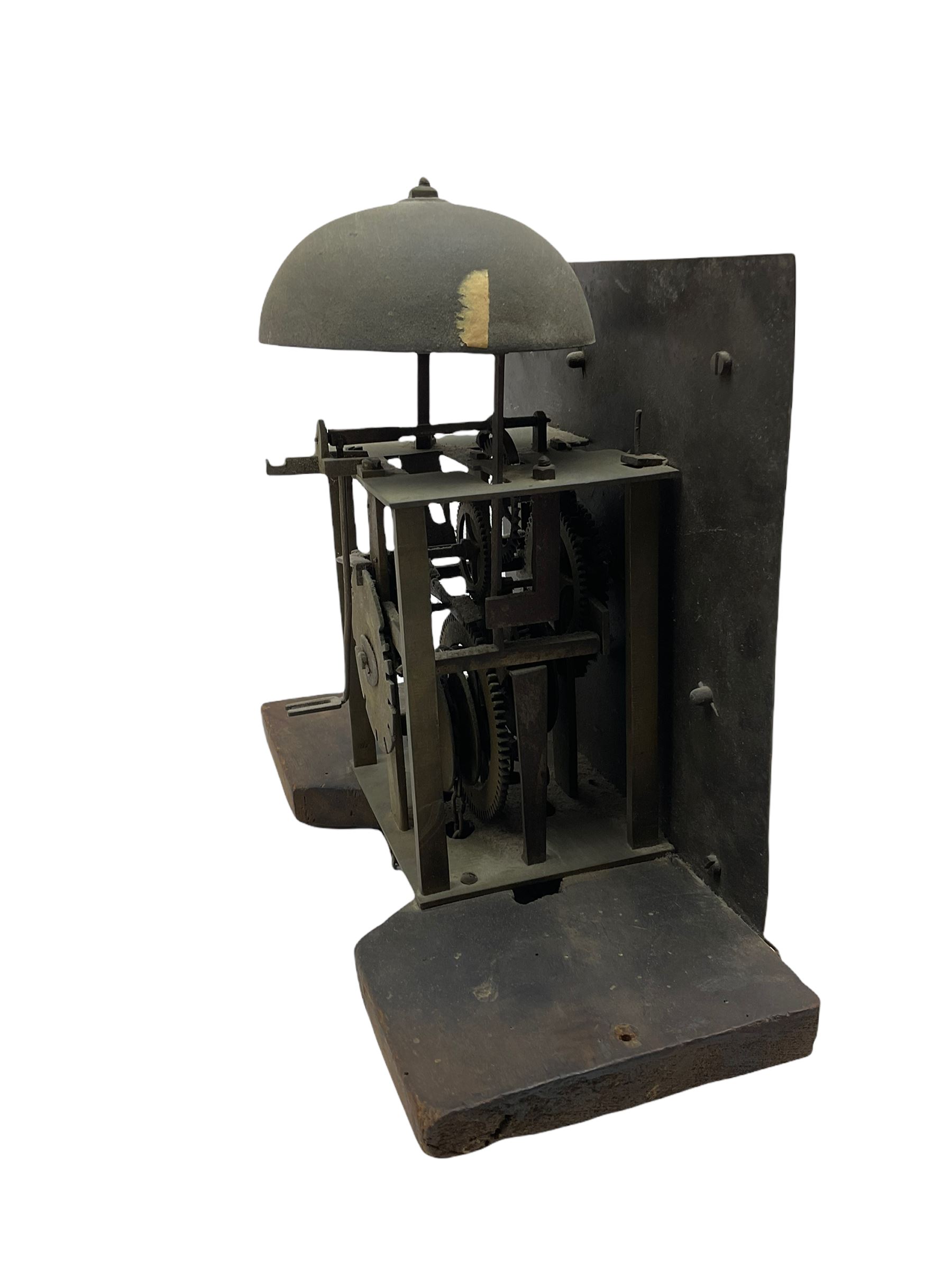 A mid-18th century 30-hour provincial longcase clock by John Darke of Holdsworthy (Devon), in an oak case with a flat-topped pediment, square hood door flanked by two free standing pillars with brass capitals, trunk with a flat-topped full-length door on a rectangular plinth with applied shaped skirting, a 9-1/2” square brass dial with a matted centre and brass (unsilvered) chapter ring, engraved with roman numerals, half and quarter hour divisions, single steel hand and 