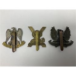 Fifteen Scottish Glengarry and other metal military badges including Argyll & Sutherland, Royal Glasgow Yeomanry, Cameronians, Lanarkshire Yeomanry, Kings Scottish Own Borderers, Highland Light Infantry, Border Regiment, Lowland Regiment, Lothians & Border Horse Yeomanry, Ayrshire Earl of Carricks Own Yeomanry etc