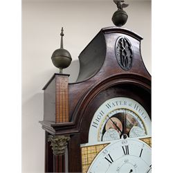 Early 19th century mahogany Hull longcase clock, pagoda top hood with finials, stepped arched glazed door flanked by fluted pilasters with gilt metal Corinthian capitals, stepped arch and moulded trunk door with shield shaped figured inlaid panel, figured base with satinwood banding, on bracket feet, enamel moon-phase dial signed 'High Water at Hull... Rd Northern, Hull', chequered spandrels, Roman chapter ring with subsidiary seconds and calendar dials, eight day movement striking on bell, H244cm