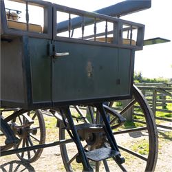 The Zetland Body Break by Peters & Sons, London

A fine and substantial late nineteenth century body break by Peters & Sons of London, circa 1880, formerly owned by the Marquis of Zetland. The carriage is finished in dark olive green and black with red, black and yellow lining, and is fitted with an elevated coachman’s box seat above a forward luggage compartment. The open rear body is entered by side doors and arranged with opposing longitudinal passenger seating.

The carriage is mounted on English pattern wooden artillery wheels with iron tyres and is carried on full elliptic springs, with a transverse helper spring behind. The front axle is fitted with fifth wheel turntable steering. The rear passenger compartment has upholstered longitudinal side benches beneath padded back rails, with turned spindle upper panels to the side doors and rear handrails. The driver’s seat is upholstered in corded fabric and secured with leather retaining straps.

Details include shaped splinter bar and turntable, folding rear step below the door with leather covered interior handle, luggage rails to either side, pole fittings for use with a pair or team of horses, and a handbrake with brake blocks operating to both rear wheels. The wheel hubs are fitted with polished hub caps engraved “Peters & Sons, London”. The exterior retains small Zetland family crests to the side panels.

The carriage has been conserved by Woods of Fairbourne Carriages Ltd and is recorded as Lot 146 in The George Shaw Collection sale, 5 November 2003, where it was catalogued as The Zetland Body Break and described as having previously been owned by the Marquis of Zetland.

Features
• Peters & Sons, London coachbuilder’s hub caps
• Known as The Zetland Body Break
• Formerly owned by the Marquis of Zetland
• Circa 1880
• Conserved by Woods of Fairbourne Carriages
• Dark olive green and black bodywork with red, black and yellow lining
• Elevated coachman’s box seat
• Forward luggage compartment
• Open rear passenger body with side doors
• Opposing longitudinal passenger seating
• Turned spindle upper panels to the side doors
• Folding rear step with leather covered interior handle
• Full elliptic spring suspension with transverse helper spring behind
• Fifth wheel turntable steering
• Handbrake with brake blocks operating to both rear wheels
• Wooden artillery pattern wheels with iron tyres
• Shaped splinter bar and pole fittings for a pair or team of horses
• Small Zetland family crests to the side panels

Provenance
The George Shaw Collection, 5 November 2003, Lot 146. Previously owned by the Marquis of Zetland.

Conservation

Conserved by Woods of Fairbourne Carriages.

Dimensions:
Overall length: 310 cm
Width: 176 cm
Height: 226 cm

Front wheel diameter: 98 cm
Rear wheel diameter: 140 cm

Seating:
Driver's box seat: 2 persons

Rear passenger compartment: Two longitudinal benches accommodating approximately 8 to 10 passengers
