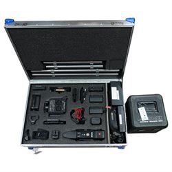 RED Epic-W Helium 8K camera body serial no. 13024E6A9, with RED EVF, three RED Mini Mag 512GB cards, one 480 Mini Mag card and reader, two RED V-Mount batteries and charger, RED top handle, Wooden Camera Easy Top top plate and one other top plate, various accessory cables, Wooden Camera bridge plate for 19mm studio rods, 12 inch Wooden Camera Dovetail plate and four 19mm studio rods to include two 380mm and two 610mm, with original Epic-W camera box and contained within a custom cut flight case