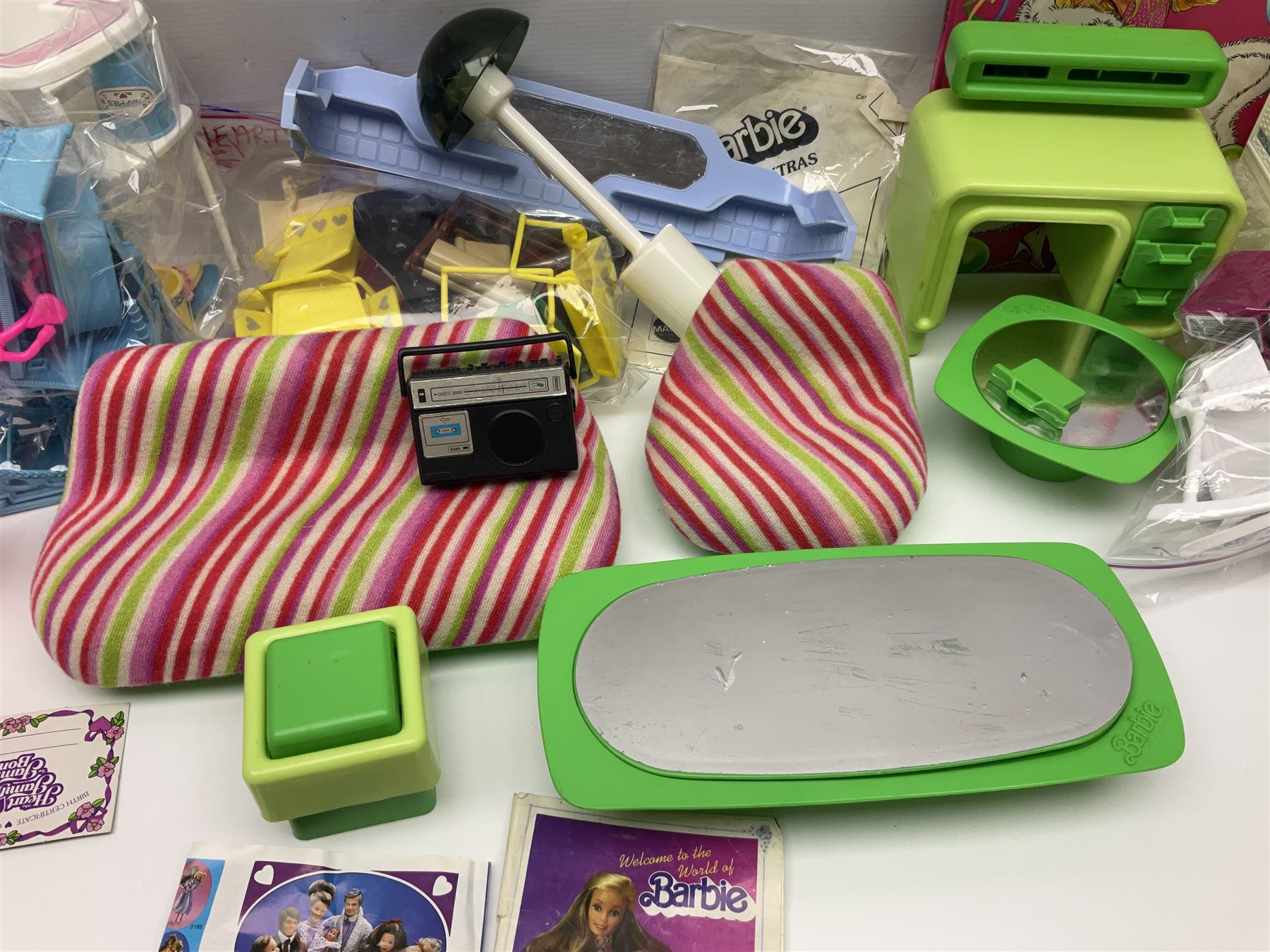Barbie - collection of 1980s accessories including furniture and outside effects, Fluff the kitten, baby's high chair, playset and nursery items, groceries, crockery, pots and pans, homewares, television, 1985 Annual, transistor radio etc; all unboxed